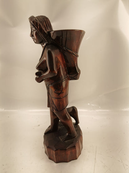 Carving of indigenous woman, carved in noble woods.