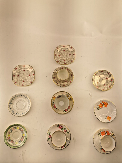 Assorted bone china set 4 cups and 10 saucers. Made in England/Japan/China