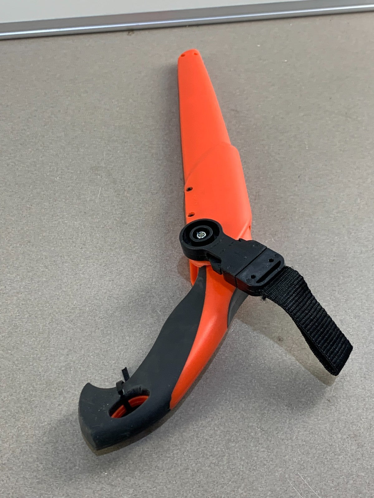 Duramax Pro Pruning Saw with its sheath.