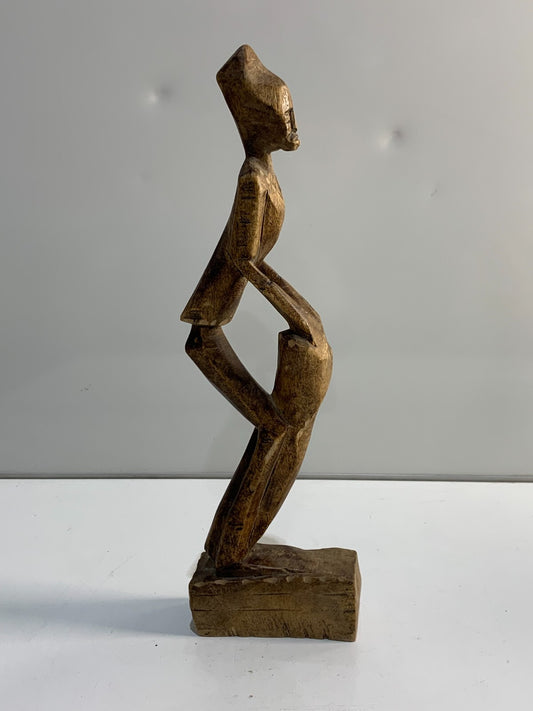 Vintage handmade Folk Art carving of a drummer.