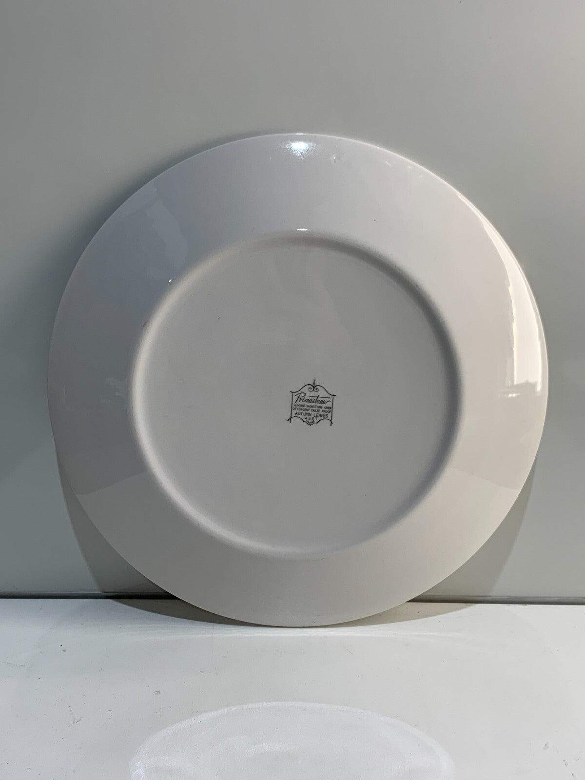 Primastone Autumn Leaves round platter made in Japan.