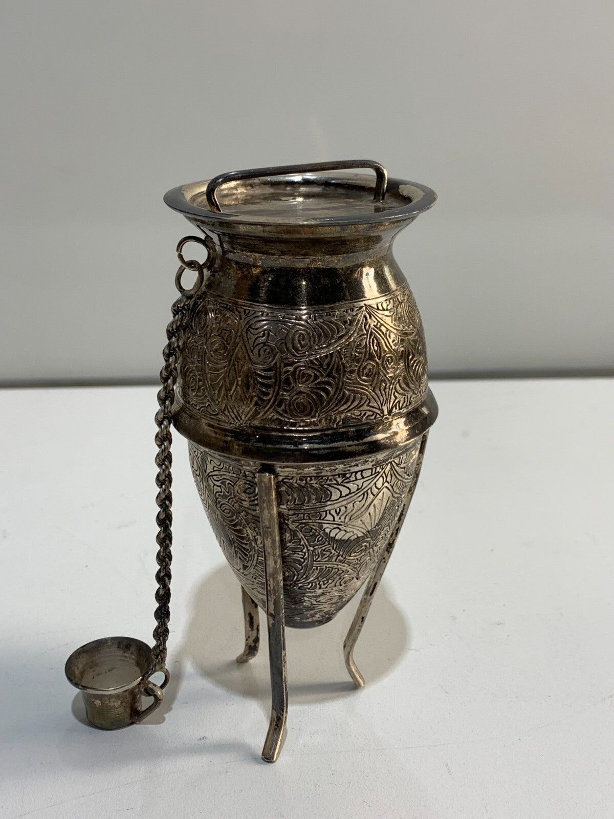Egyptian solid silver miniature amphora with stand and lid.