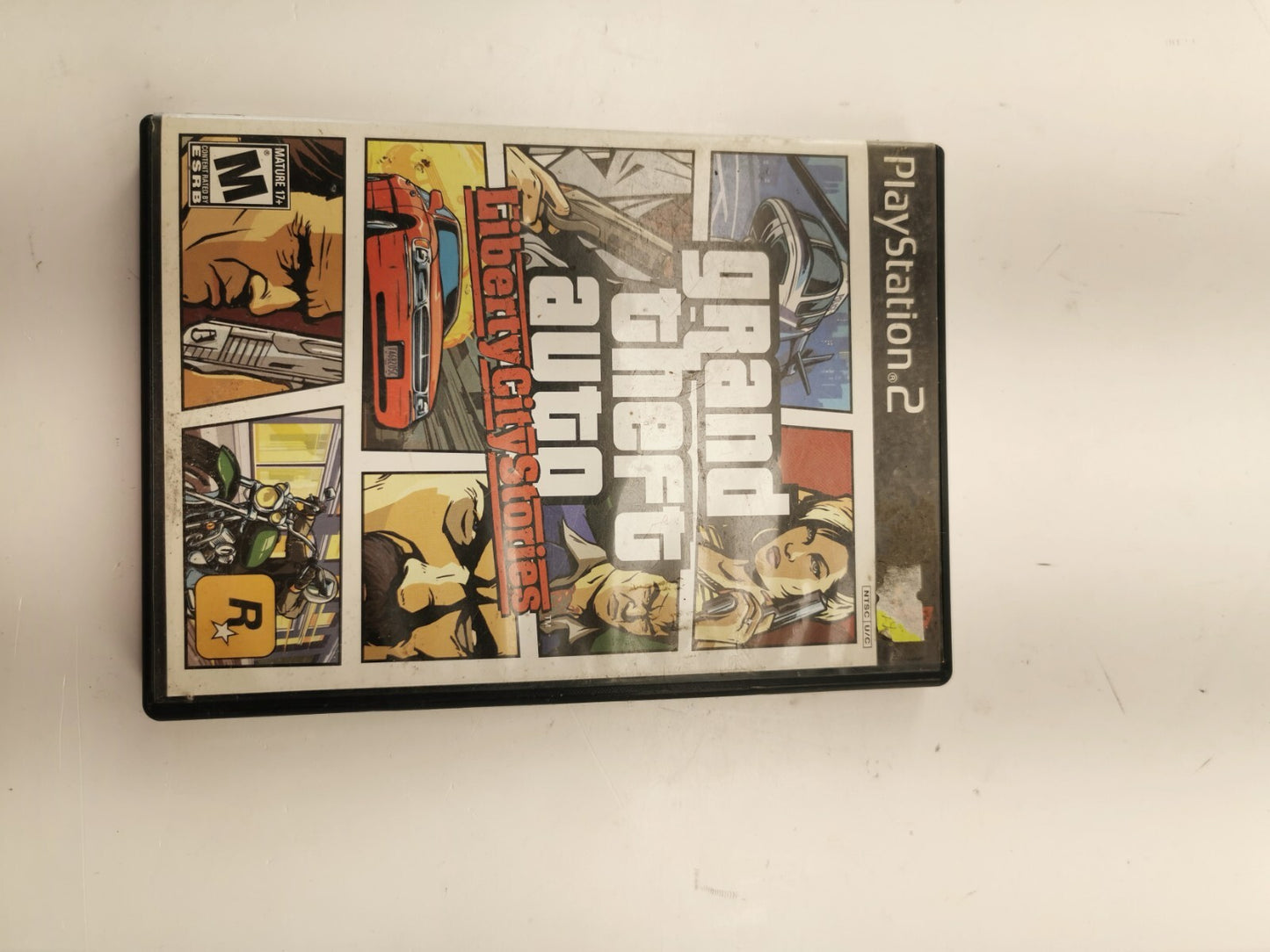 Grand Theft Auto: Liberty City Stories (Sony PlayStation 2, 2006)