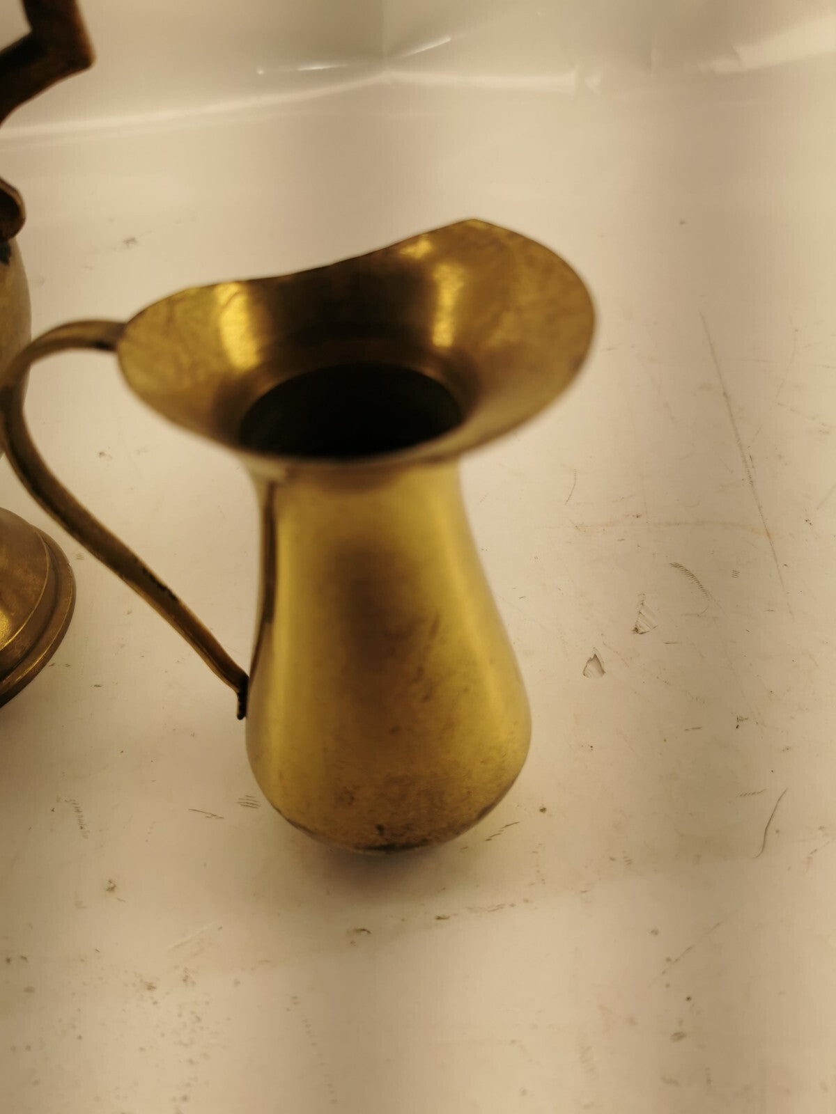 Brass pitcher W/ one freebie