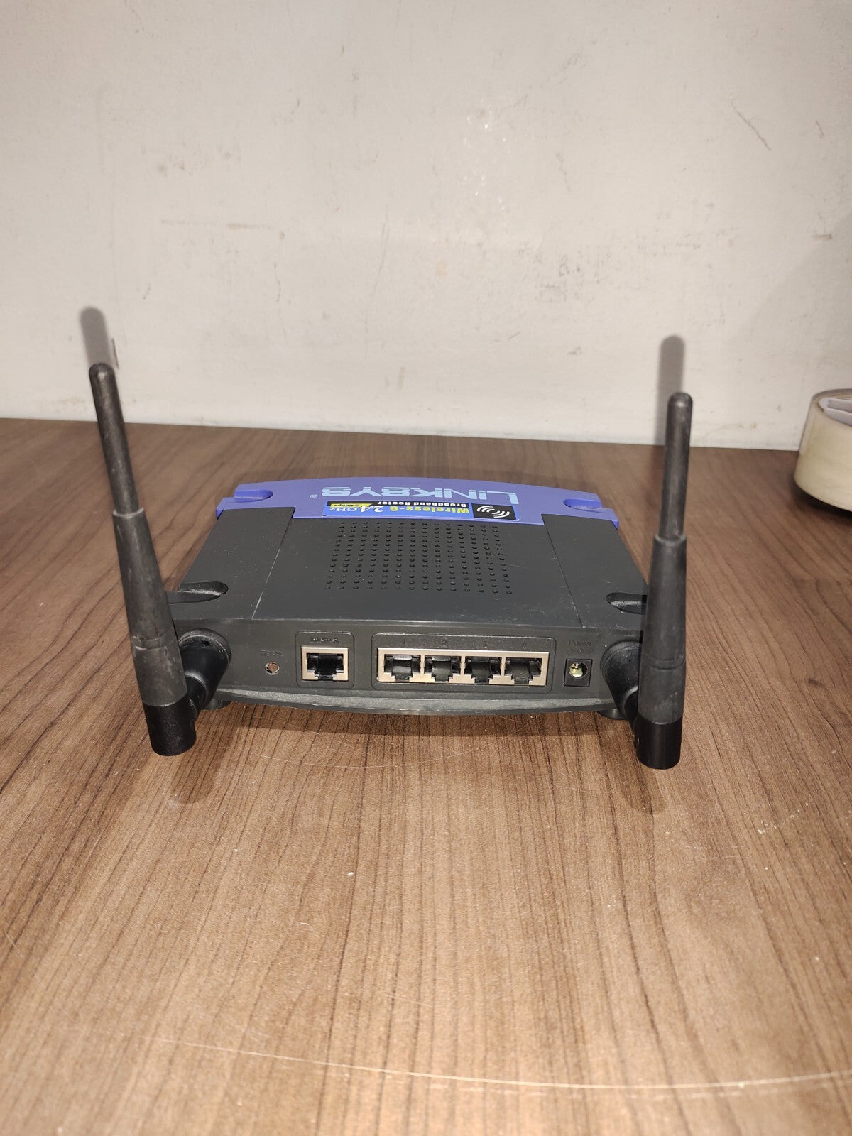 Linksys WRT54G-TM 54 Mbps 4-Port 10/100 Wireless G Router (WRT54GTM)