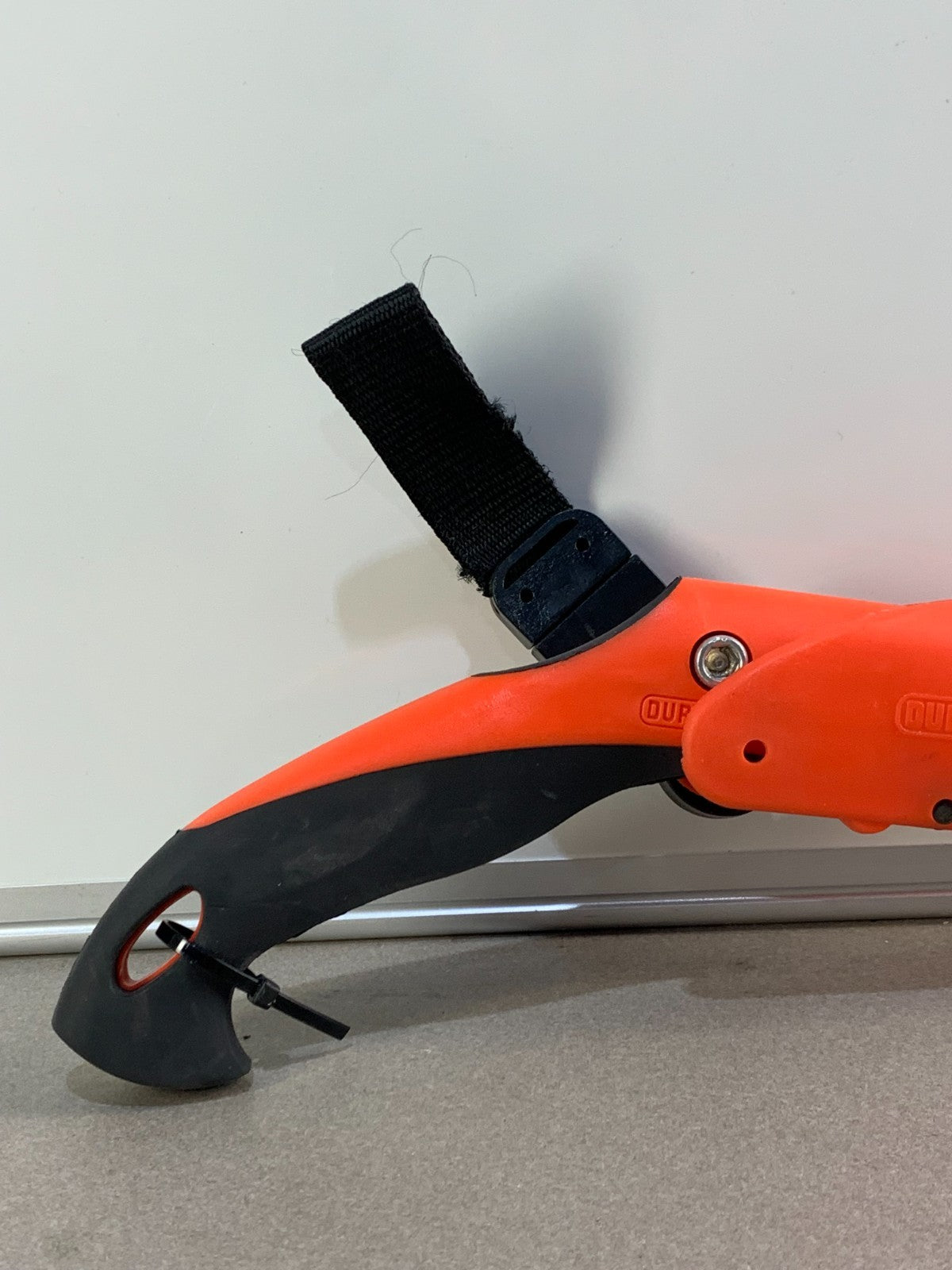 Duramax Pro Pruning Saw with its sheath.