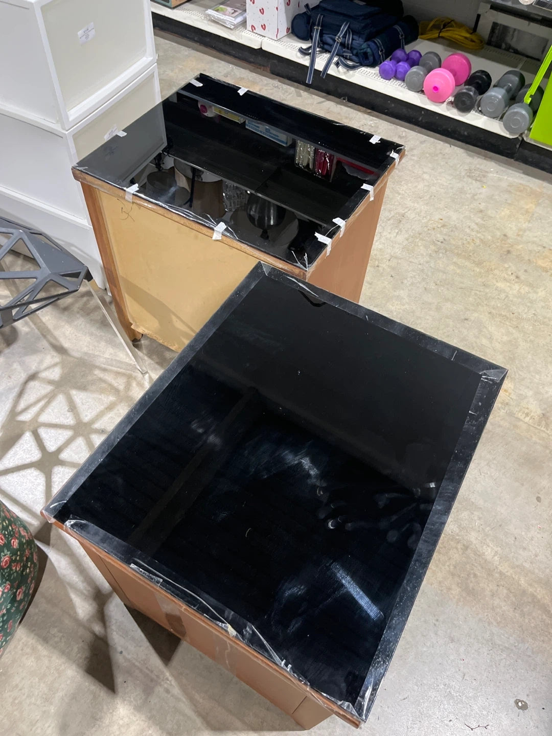 Two Wooden 2-Drawer Nightstands with Black Top