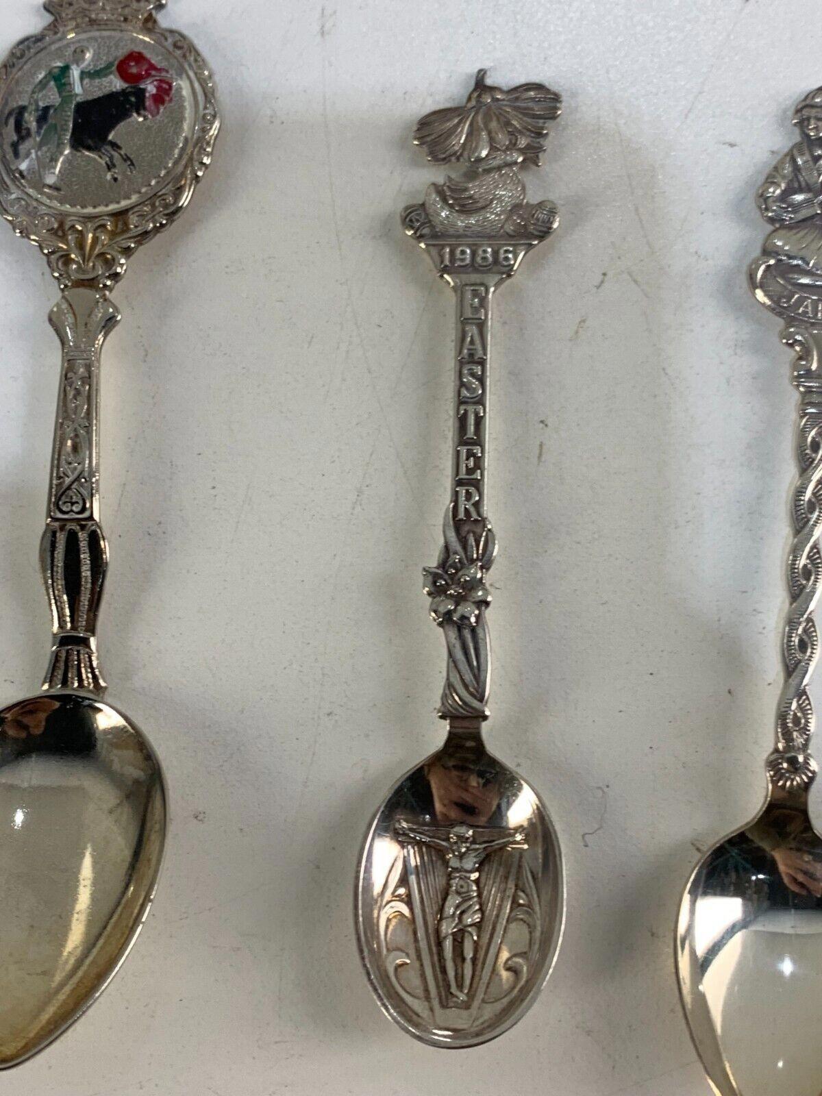 Lot of 5 Collector/souvenir spoons