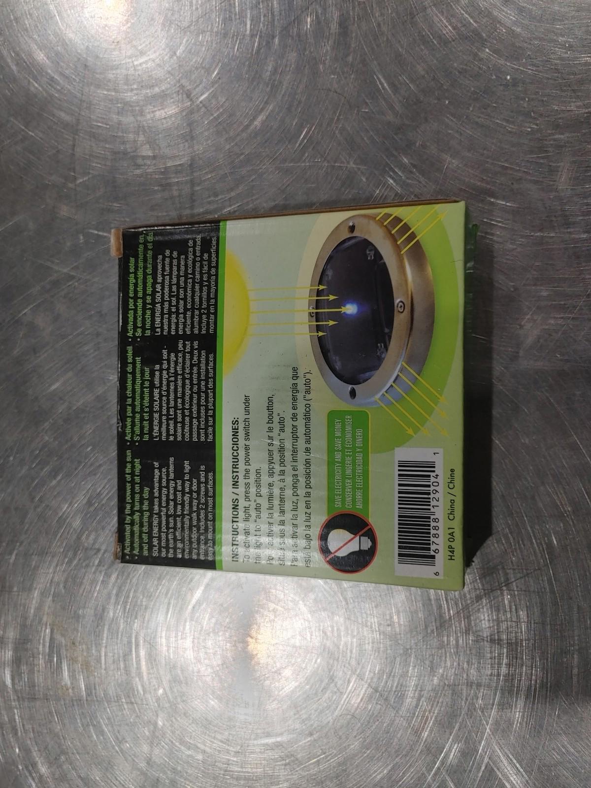 Brand New in Box Lot of 4 Solar Yard Lights Silver