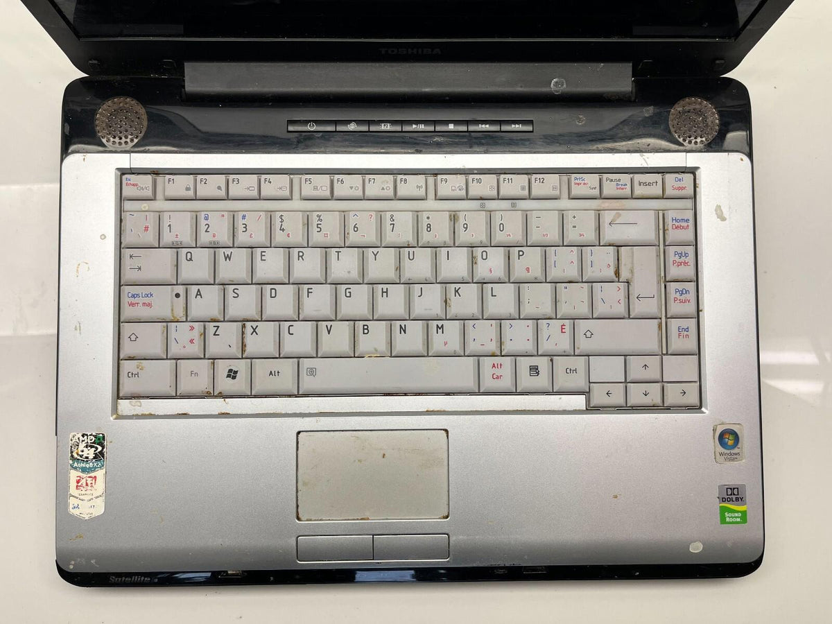 Toshiba Satellite A210 Athlon 64 X2 @ 1,60 GHz 2 Go de RAM Sans disque dur Sans système d’exploitation Écran défectueux