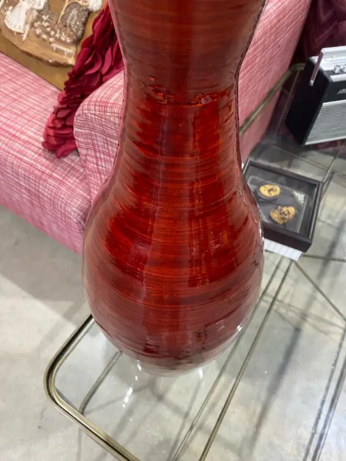 Red Vase with Decorative Twigs