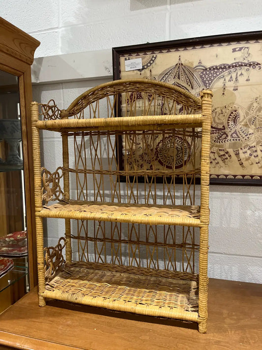 vintage three-tiered rattan bookcase or shelf