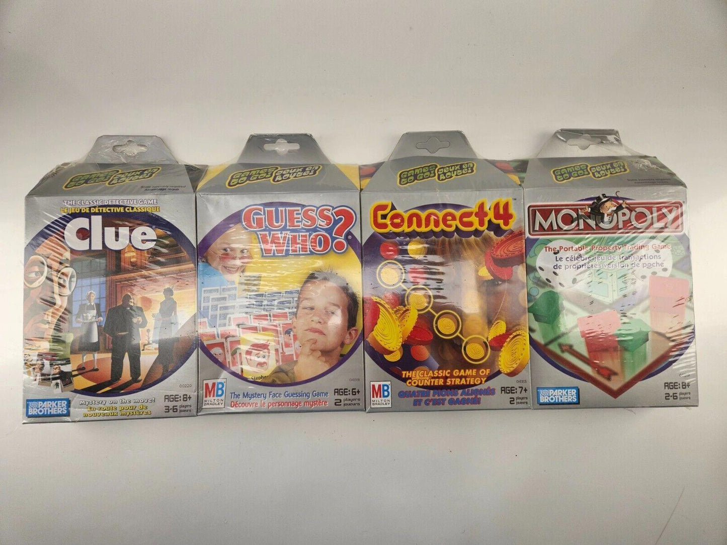 Travel Games To Go - Clue - Guess Who - Connect 4 - Monopoly