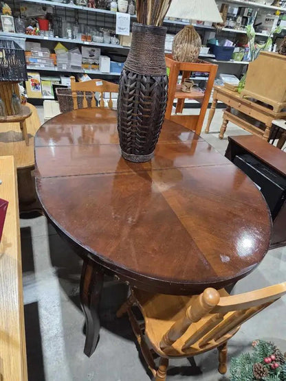 Dark Wooden Oval Extending Dining Table
