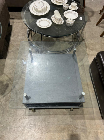 Square glass coffee table on wheels