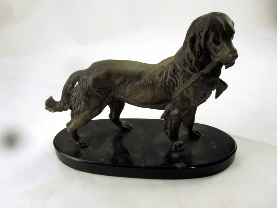 Bronze Dog with Duck Statue on Oval Base – Duck Damage