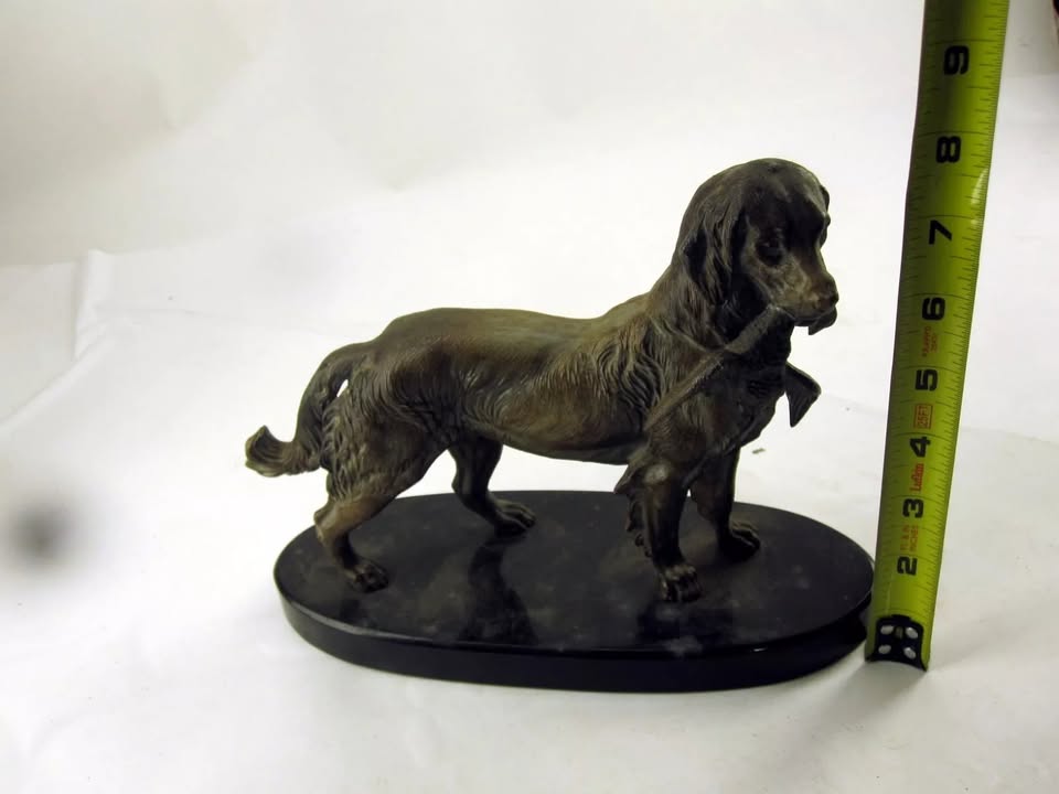 Bronze Dog with Duck Statue on Oval Base – Duck Damage