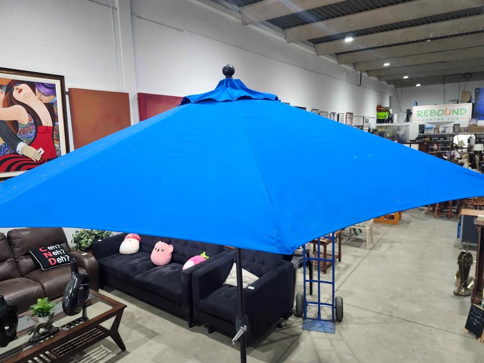 Sunbrella "The Lean" Auto Tilt Patio Umbrella with Stand - 9ft wide