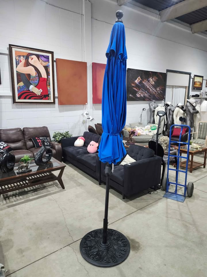 Sunbrella "The Lean" Auto Tilt Patio Umbrella with Stand - 9ft wide