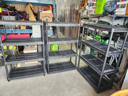 Three Black Plastic Adjustable Shelving Racks
