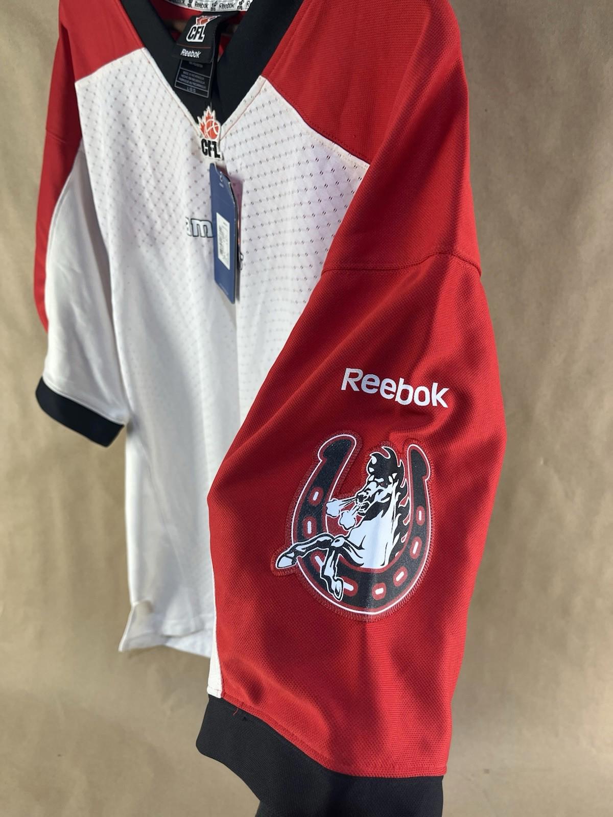 NWT Reebok CFL Calgary Stampeders Jersey Signed by #76 (Size L)