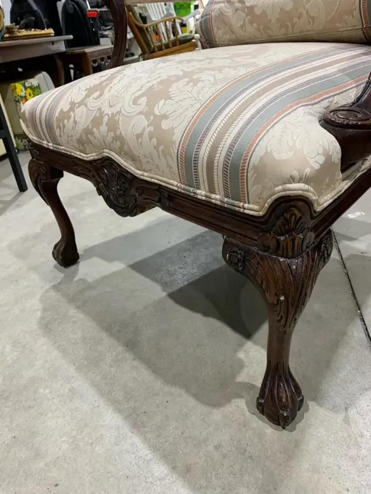 Vintage upholstered Accent Chair with carved details