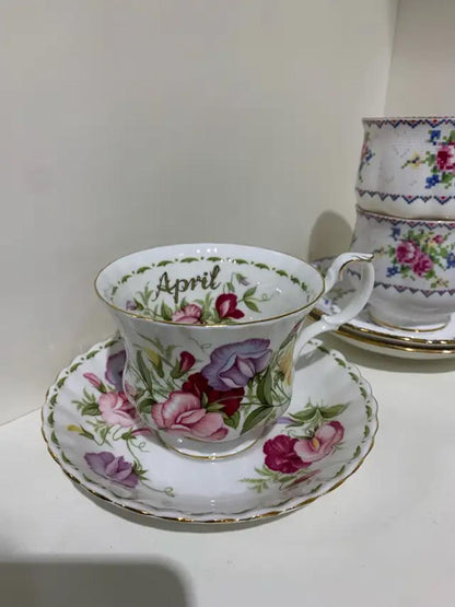 Antique Tea Cups with Floral Designs