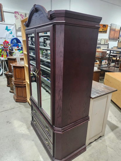 Dark Wood Armoire with Mirrored Doors and Drawers