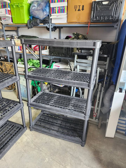 Three Black Plastic Adjustable Shelving Racks