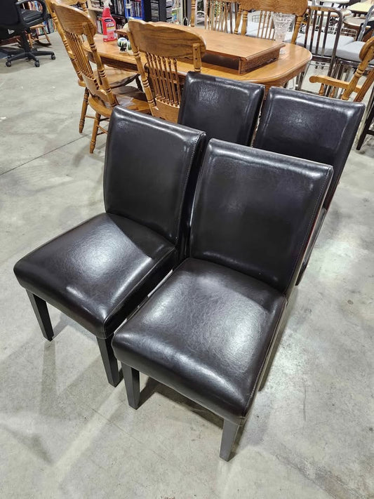 Four Brown Leather Dining Chairs