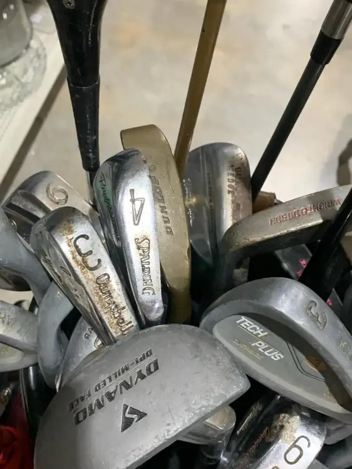 Assorted Golf Clubs and drivers