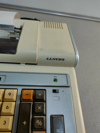 Lloyd's Electronics Accumatic Adding Machine model E104 Calculator