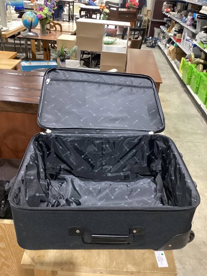 DELSEY Black Rolling Suitcase