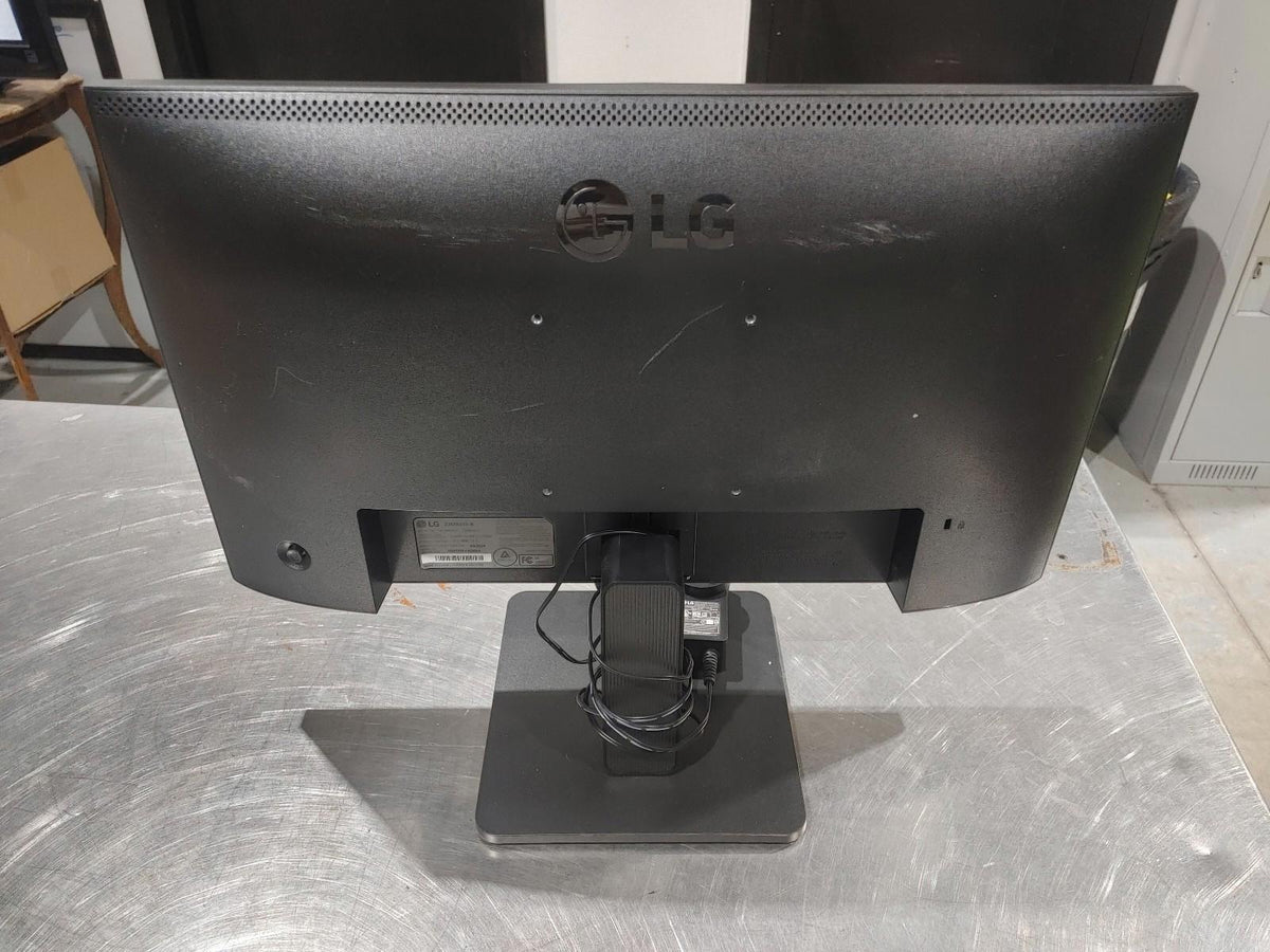Moniteur LCD LG 22 pouces modèle 22MR41S-B en bon état, testé et fonctionnel, noir