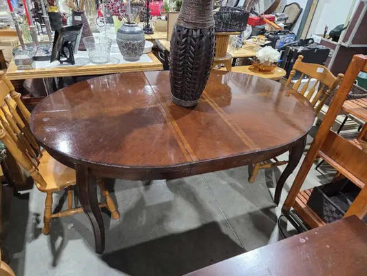 Dark Wooden Oval Extending Dining Table