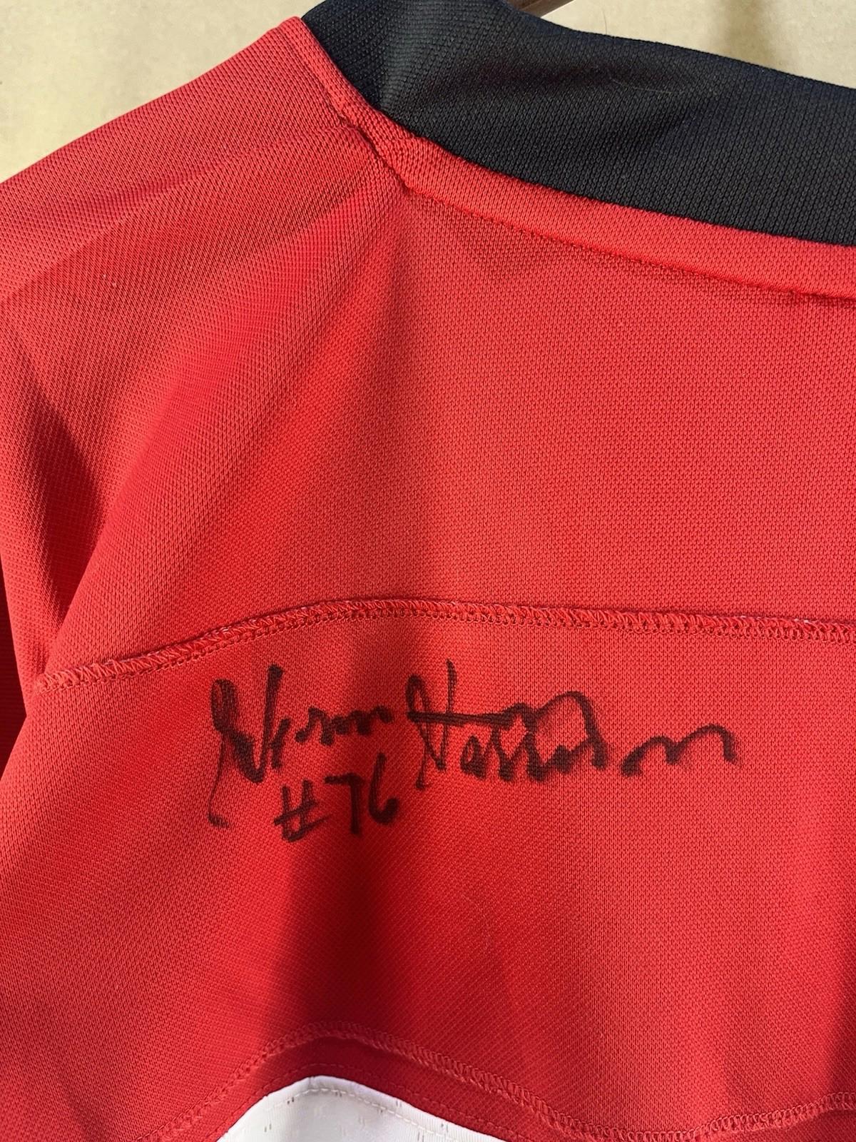 Reebok CFL Calgary Stampeders Jersey Signed by #76 (Size L)