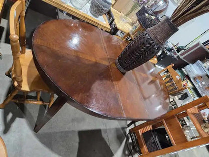 Dark Wooden Oval Extending Dining Table