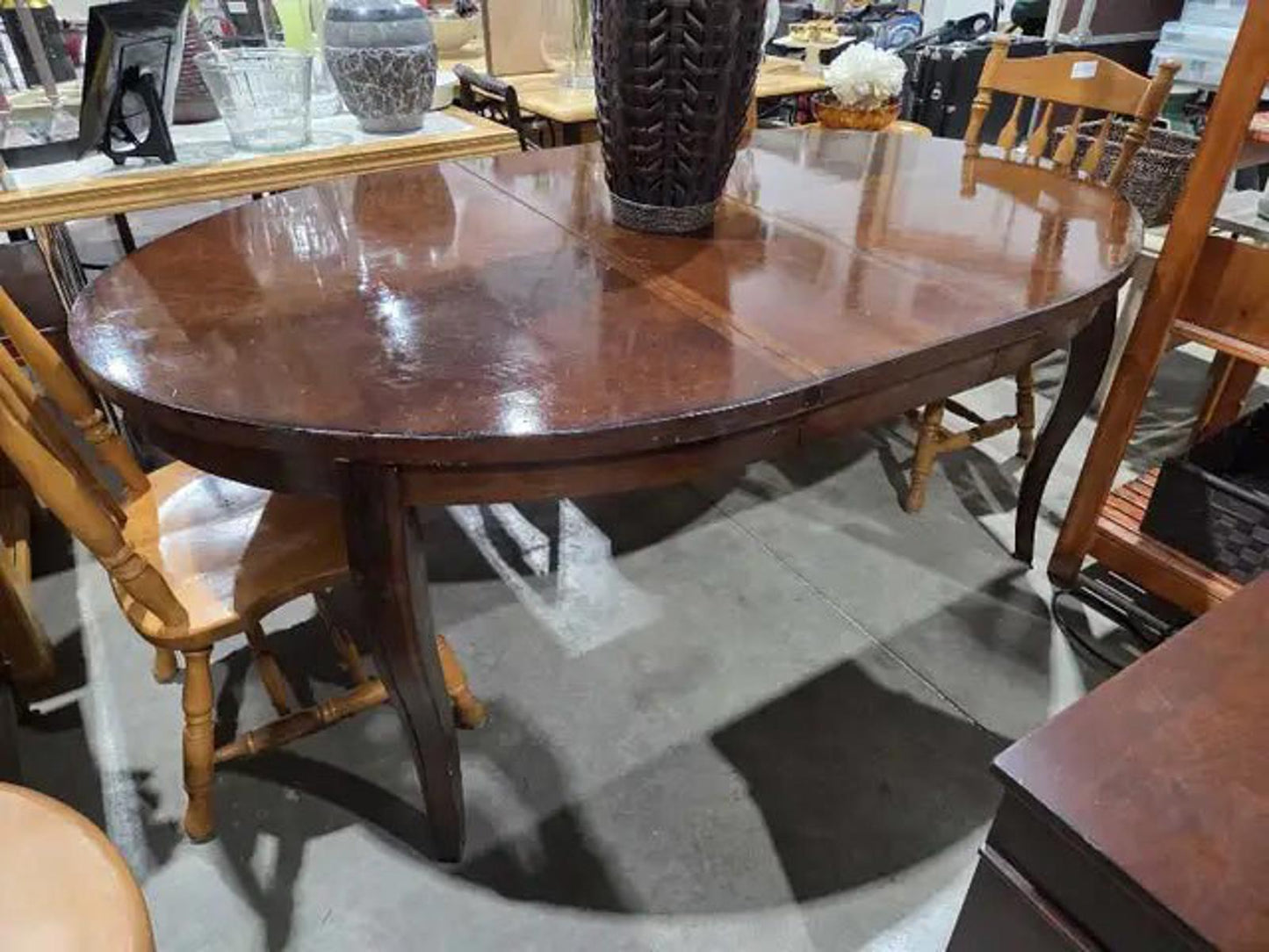 Dark Wooden Oval Extending Dining Table