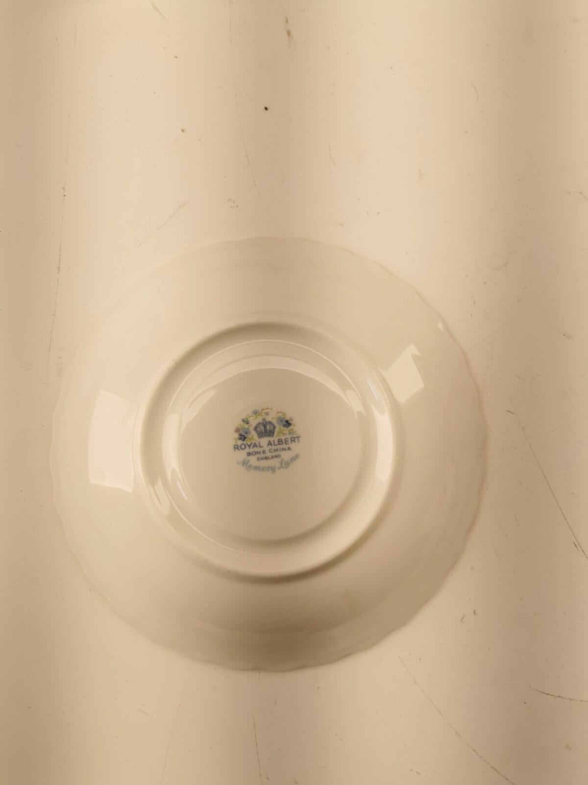 Assorted bone china set 4 cups and 10 saucers. Made in England/Japan/China