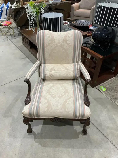 Vintage upholstered Accent Chair with carved details