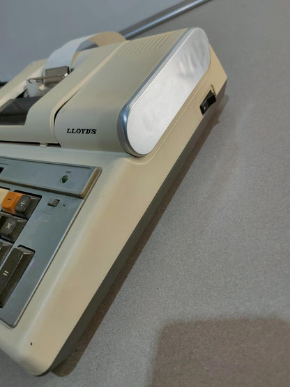 Lloyd's Electronics Accumatic Adding Machine model E104 Calculator