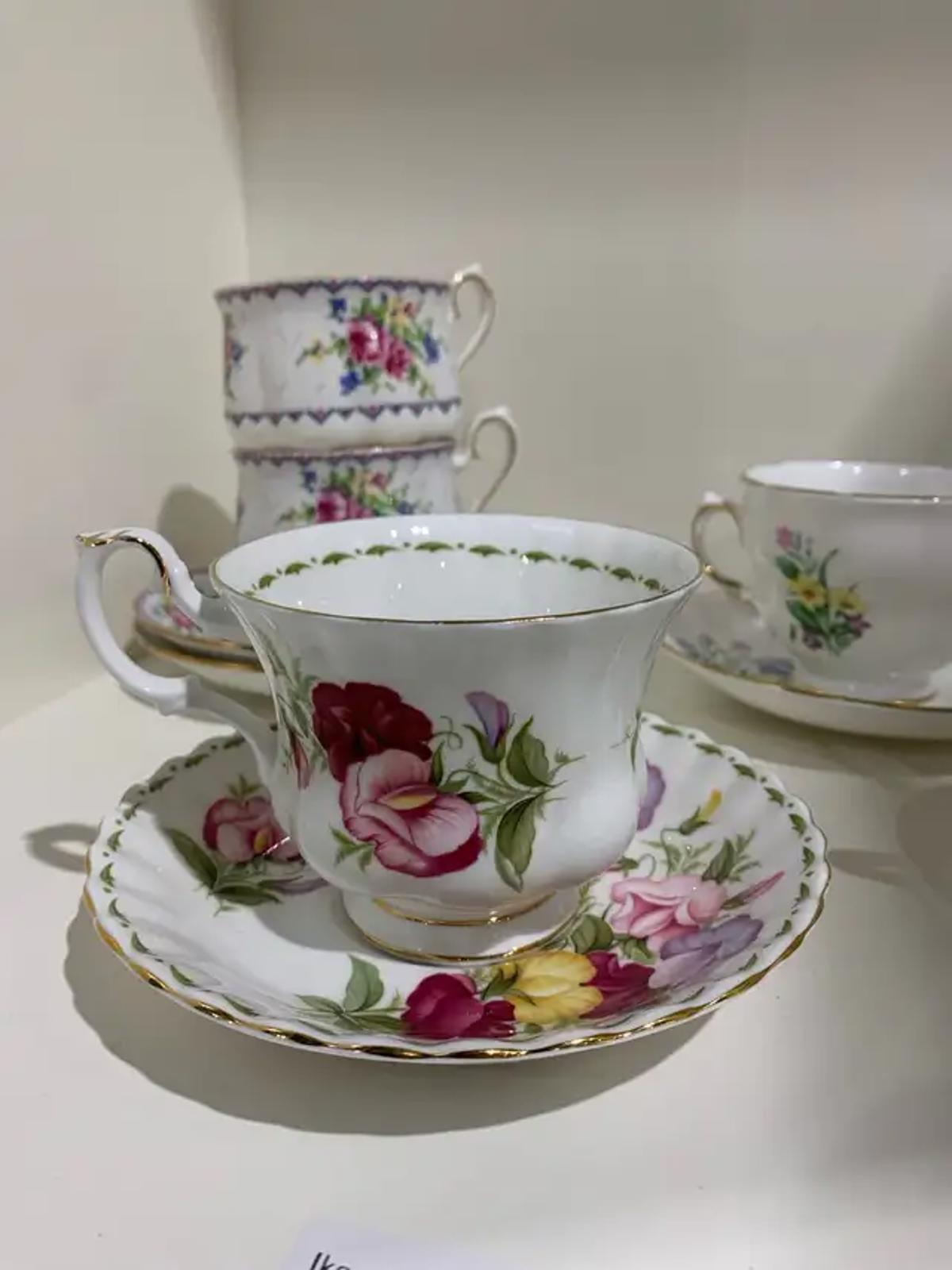 Antique Tea Cups with Floral Designs