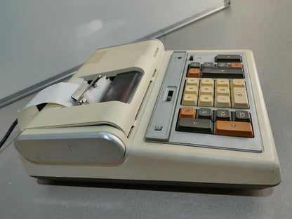 Lloyd's Electronics Accumatic Adding Machine model E104 Calculator