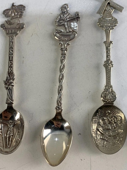 Lot of 5 Collector/souvenir spoons