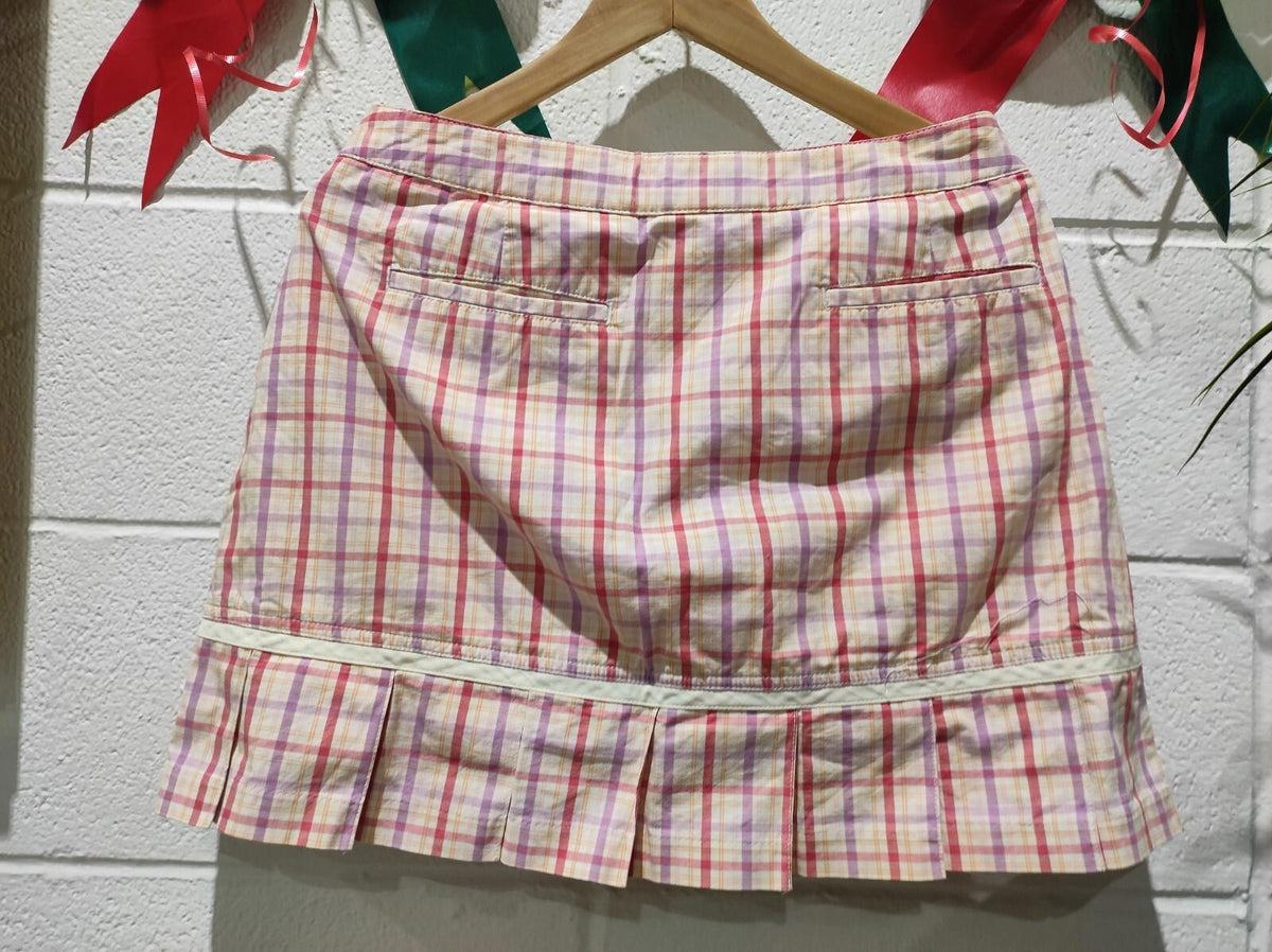 Jupe-short de golf Adidas taille 8 à carreaux roses et violets avec ourlet plissé