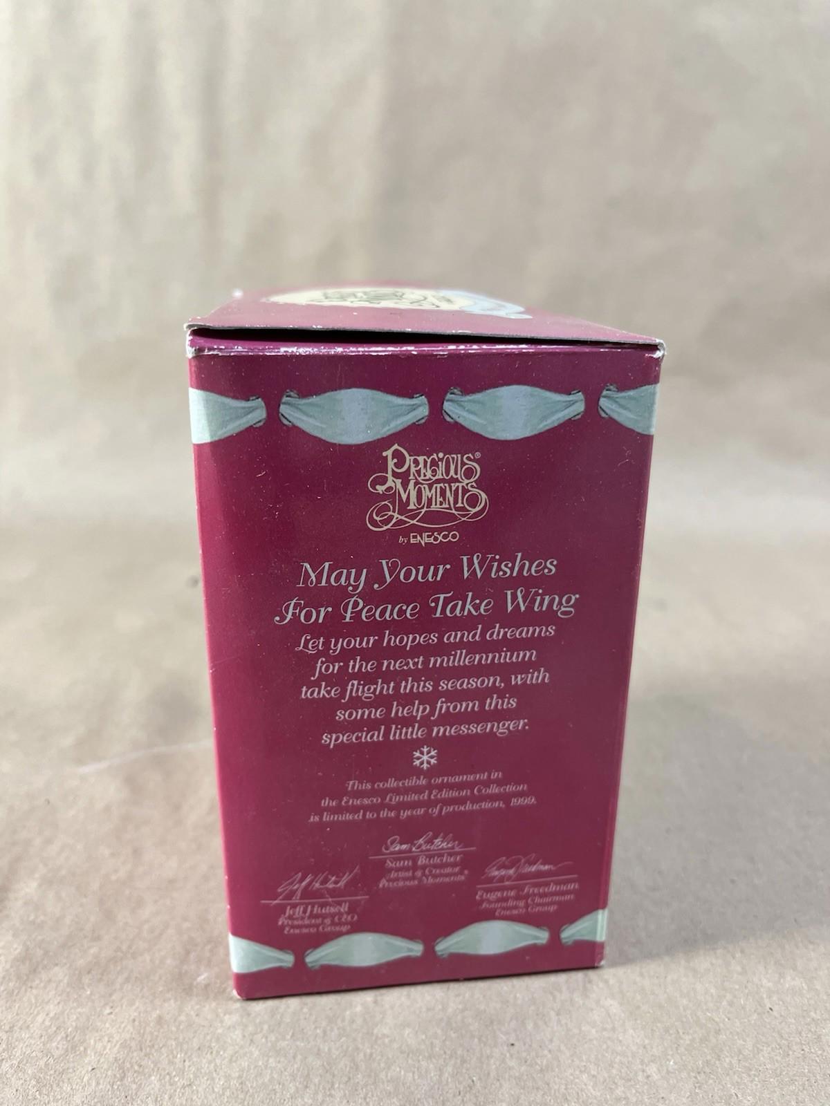 Precious Moments Ornament – May Your Wishes For Peace Take Wing (1999)