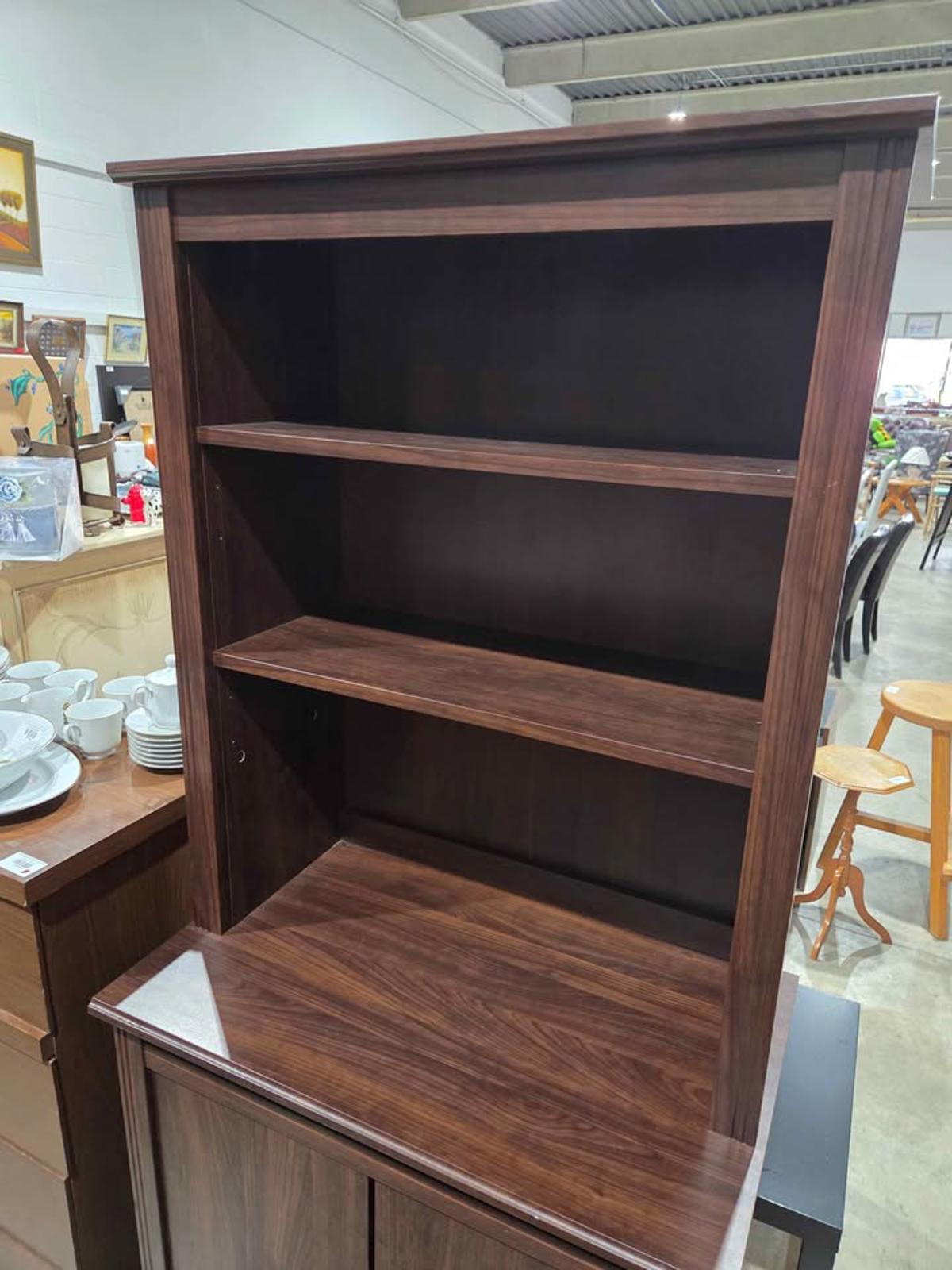 IKEA BRUSALI High Cabinet with Doors in Brown.
