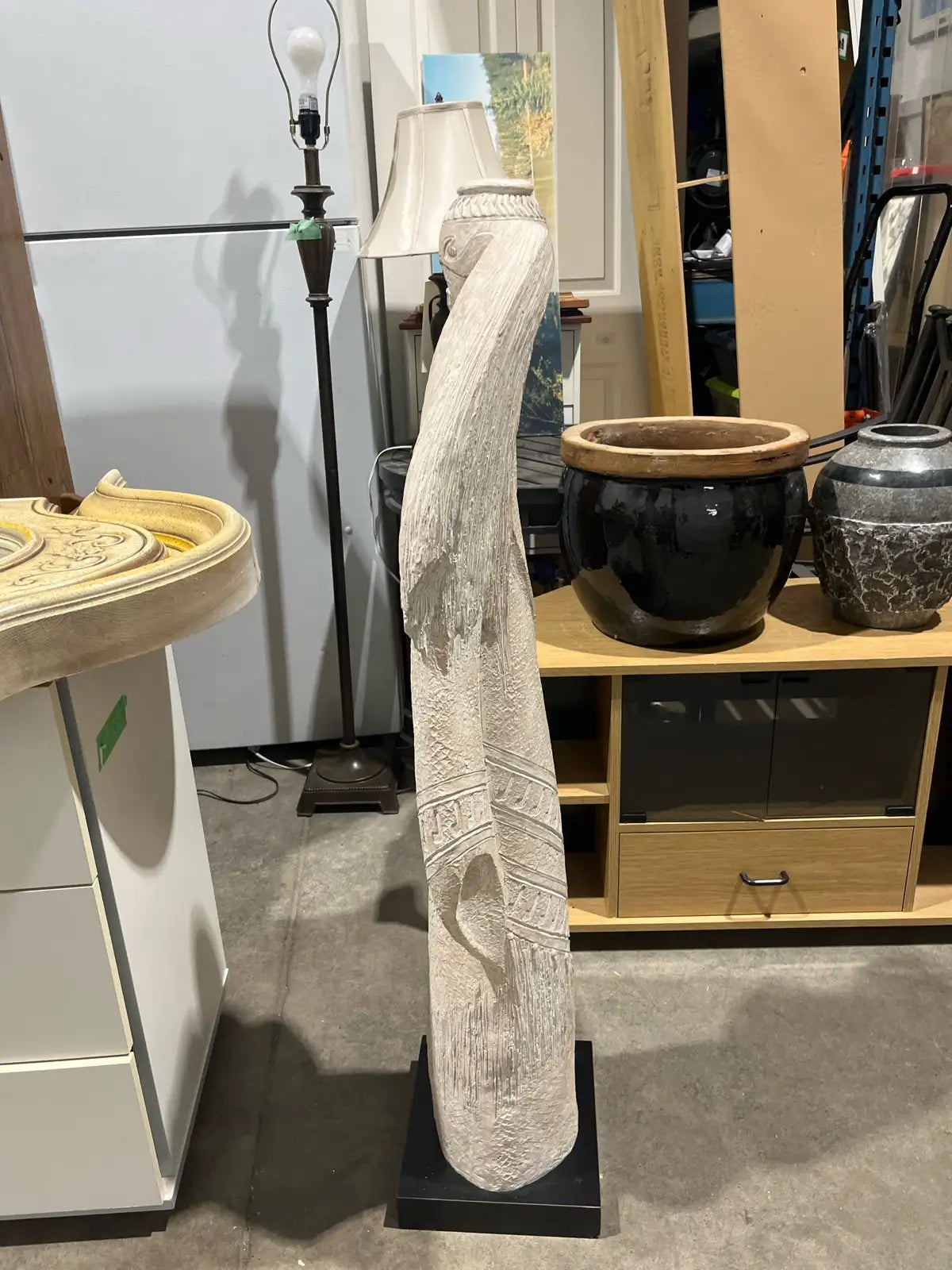 Statue of the woman with a pitcher