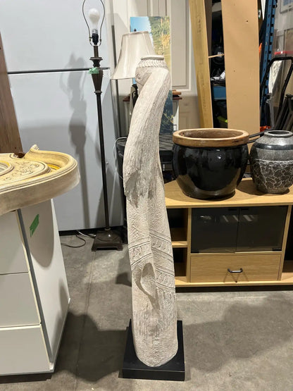 Statue of the woman with a pitcher