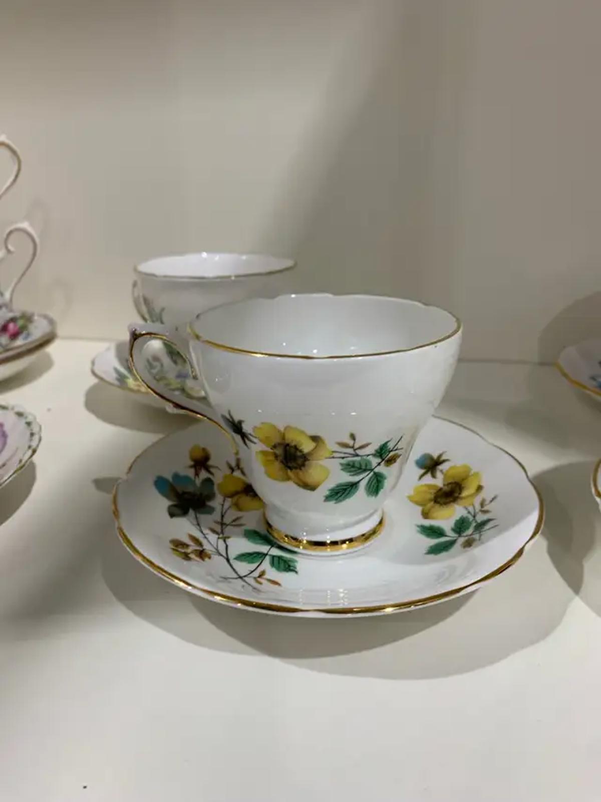 Antique Tea Cups with Floral Designs